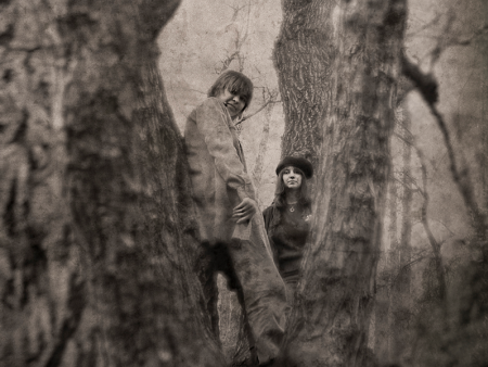 Photo of people between trees by Glory Anna