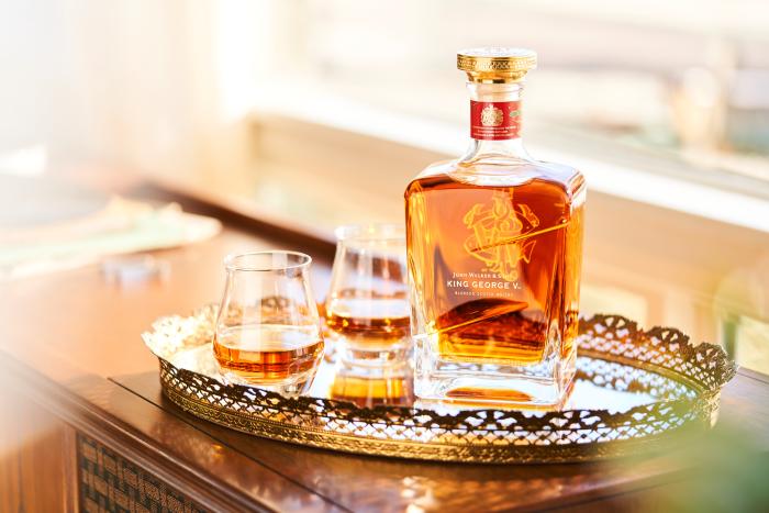 Whisky bottle and glasses on a tray - photo by Kate Blakeman