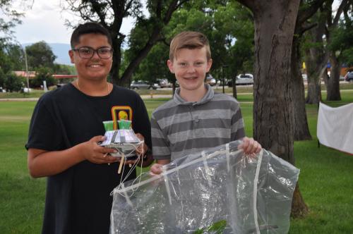 Student with robotics projects during ACC Summer Youth Camp.