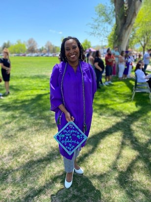 An ACC Medical Assistant program graduate in regalia at ACC's Commencement Ceremony.