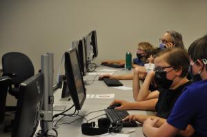 ACC Summer Youth Camp students in coding session.