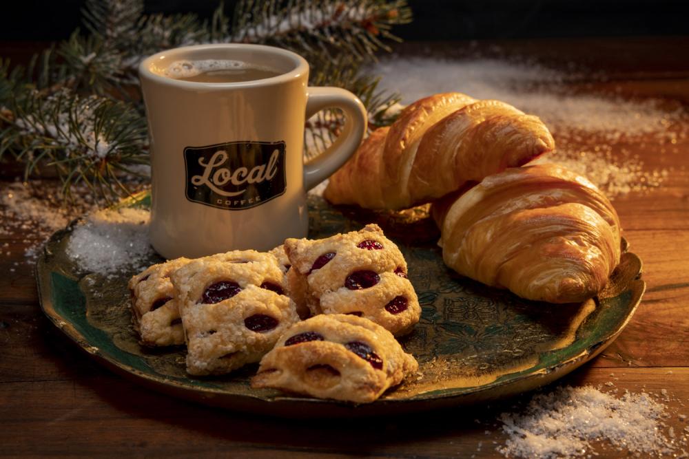 photo of coffee cup and pastries - photo by Mercedes Gania