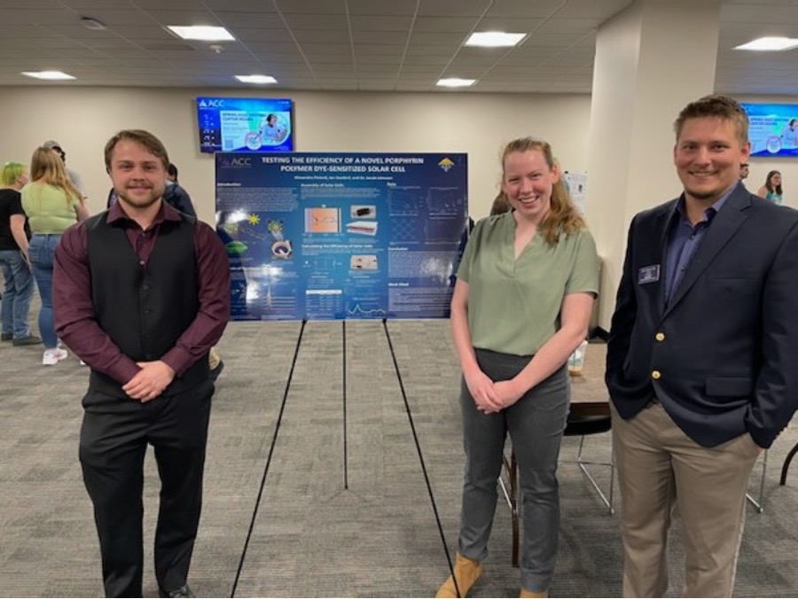 Pictured (left to right): Ian Seedorf, Alexandra Poland, and Dr. Jacob Johnson. Ian and Alexandra presented the poster on the Porphyrin Polymer Novel Dye-Sensitized Solar Cell.