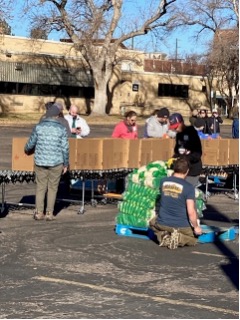 volunteers packing boxes for Fresh Thanks Day