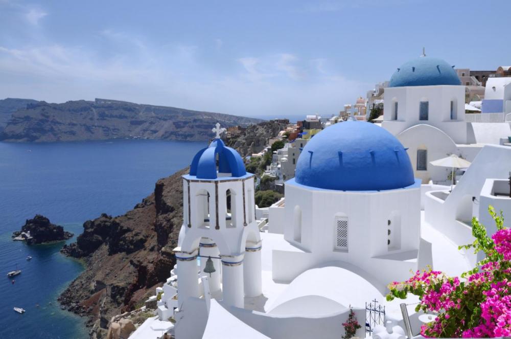 Greek homes on cliffside - photography by Trish Sangelo