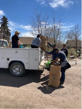 Volunteers helped Chatfield staff load up bags with leaves, branches, weeds, and unfortunately lots of rubbish.