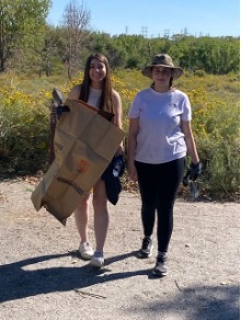 Volunteers with trash bags.