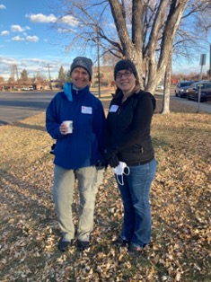 Service Learning Center Coordinator Diana Hornick and Human Resources Coordinator April Noblet warmed up with coffee and conversation prior to assembling and filling boxes.