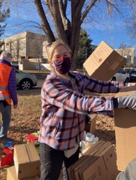 Alongside ACC staff and students, several faculty members cheerfully helped throughout the day, including Math Faculty Kelli McCarthy.