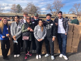 Kristi Doherty and some of her Interpersonal Communication students showed up for their Service Learning project to support and learn more about those needing food assistance.