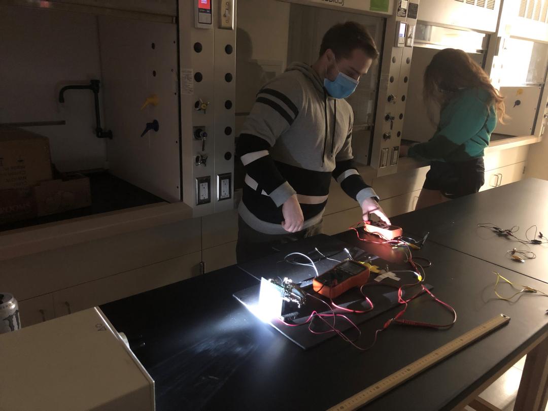 ACC Research Scholars, Ally and Ian, measuring the IV curve parameters for our assembled solar cells