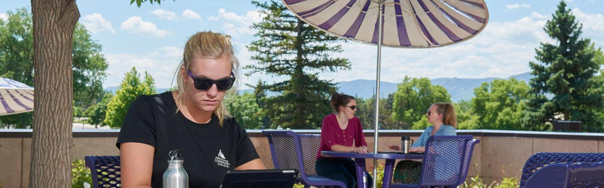 ACC Student on Patio