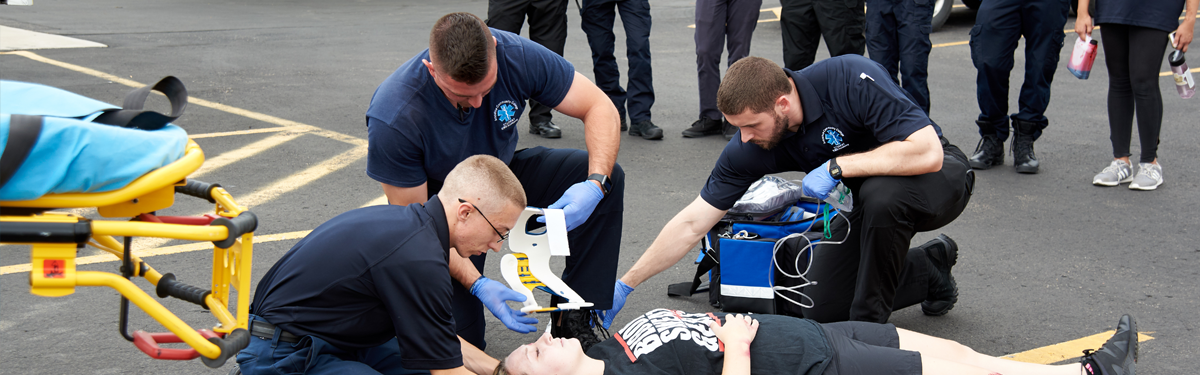 ACC EMT students practicing assessment during a simulation exercise. 