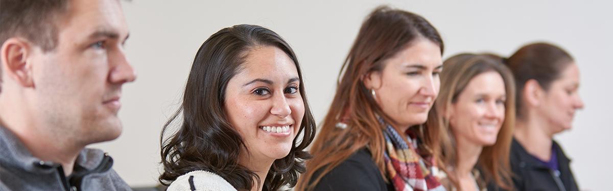 ACC students sitting in a classroom at the Littleton Campus.