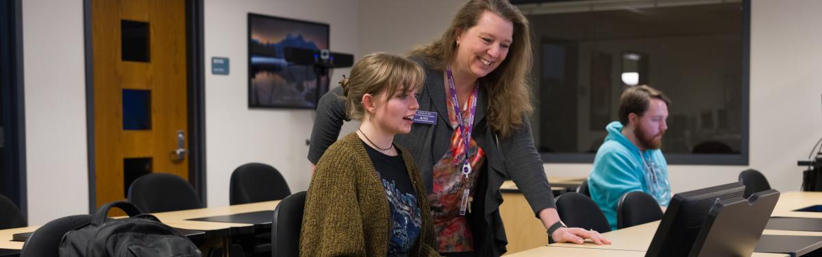 A student being assisted by ACC Learning Technology staff.