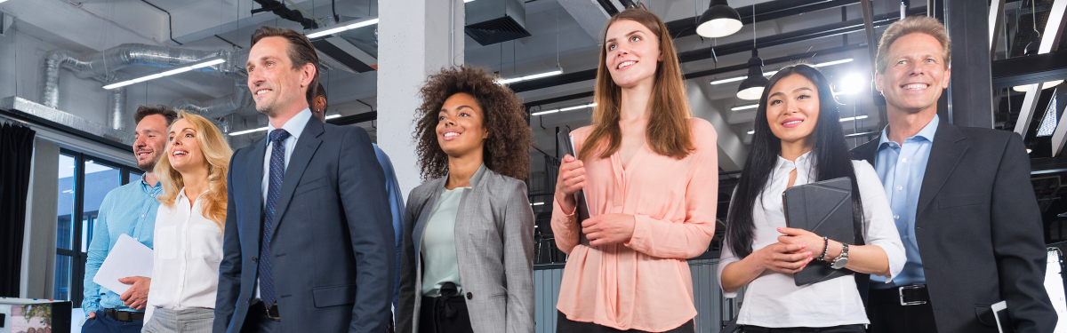 Business people standing and walking in an office setting