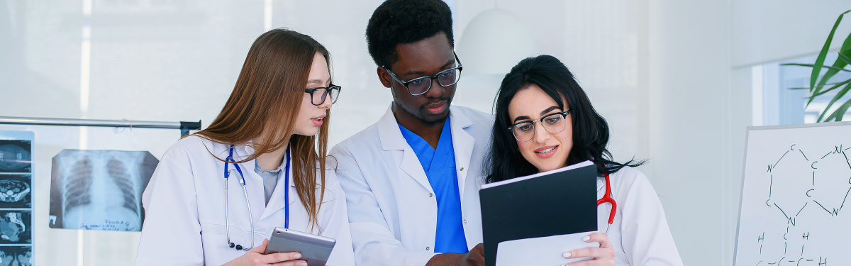 doctors reviewing scans in a room