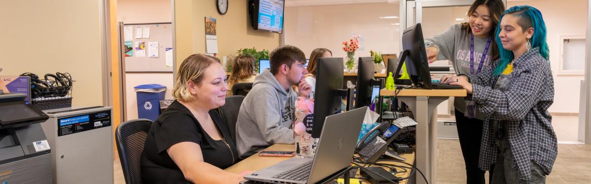 ACC students getting assistance in the Advising office at the Littleton Campus.