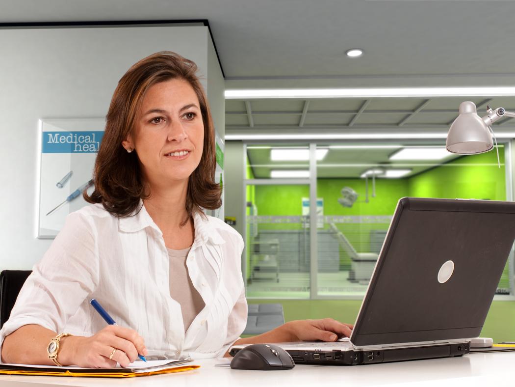 Woman in healthcare at computer