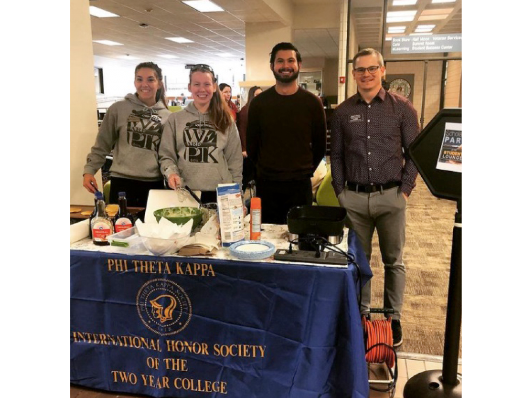 ACC Phi Theta Kappa students in Littleton Campus student lounge.