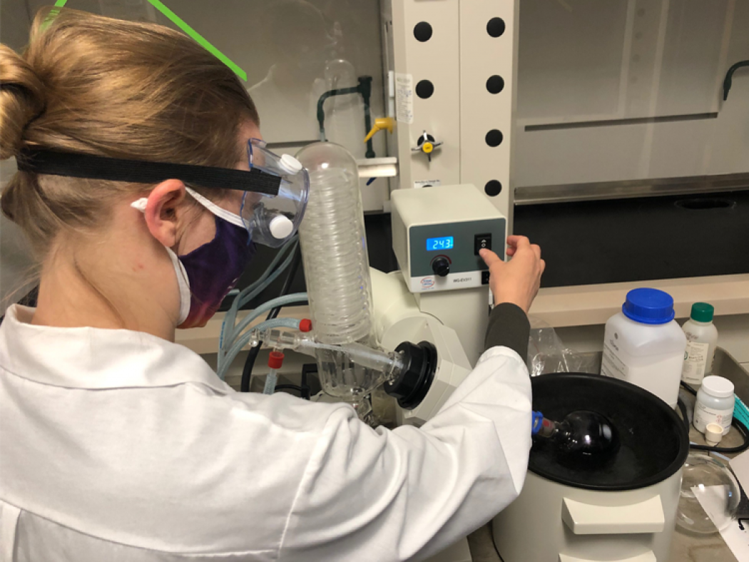 Brittany, ACC research scholar, operating the rotovap, removing the solvent from our porphyrin dye in solution.