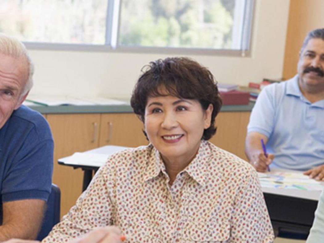 Adult students sitting in an ACC Workforce & Community Programs class.