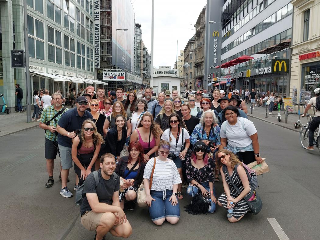 ACC study abroad students and faculty at Checkpoint Charlie in Berlin, Germany.