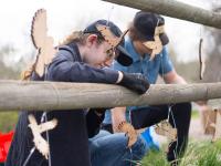 Flight of Daedalus, students installing art installation.