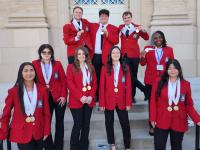 ACC automotive technology students pose with medals at SkillsUSA competition.