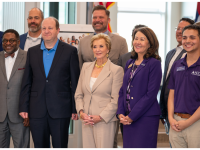 ACC President Stephanie Fujii, Colorado Governor Jared Polis, Secretary of Education Linda McMahon pose for a photo with alumni, educational, industry, and community partners at the Sturm Collaboration Campus at Castle Rock during a visit to showcase The Big Blur and workforce innovation.