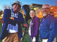 ACC astronomy faculty and instructors pose next to a telescope on the West Lawn of the Littleton Campus during a Star Party event.