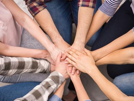 Students all hands in