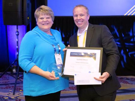 ACC Vice President for Student Affairs Lisa Matye Edwards receiving EAB Visionary Leadership Award