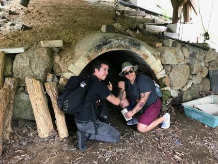 Ceramic students inspecting a kiln - Japan 2018