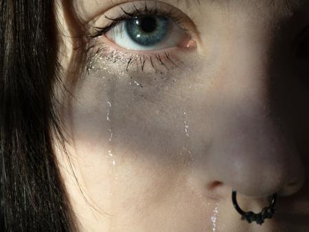Woman crying close-up (photo by Nicole Hartman)