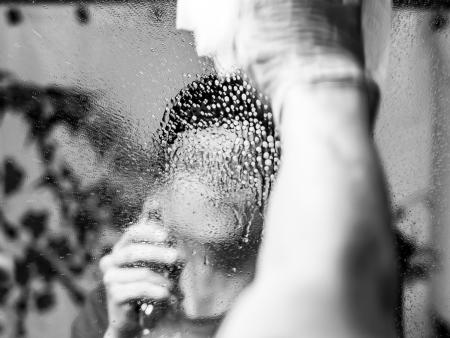 Photo of person in water through glass by Alex Oslund, ACC Photography student