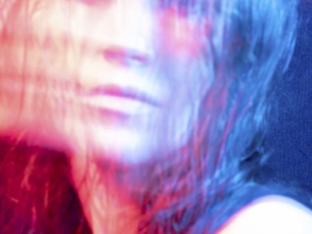 Blurred image of woman's face. Photo by Fara Francis, ACC photography student