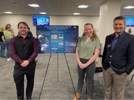 Pictured (left to right): Ian Seedorf, Alexandra Poland, and Dr. Jacob Johnson. Ian and Alexandra presented the poster on the Porphyrin Polymer Novel Dye-Sensitized Solar Cell.