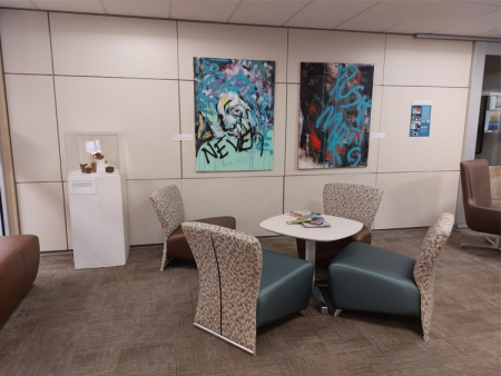 ACC student artwork displayed in the Advising office at the Littleton Campus.