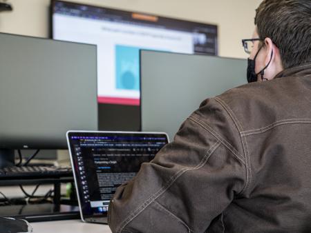 ACC Secure Software Development student in computer lab at Sturm Collaboration Campus at Castle Rock.