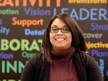 An ACC accounting student in a business classroom at the Littleton Campus.