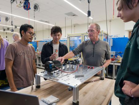 ACC Robotics and Automation students working in the lab at the DCSD Legacy Campus in Lone Tree, CO.