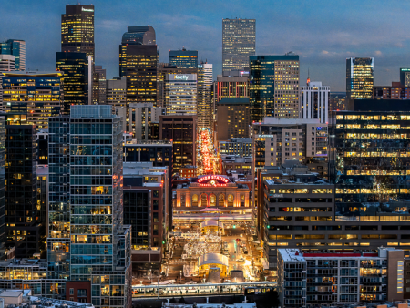 photo of a city at night by Peter Loyd Vuolo