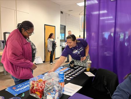 Behavioral health faculty member, Sonya Riffel, connecting with students at an event at the Littleton Campus.