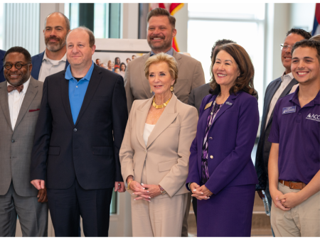 ACC President Stephanie Fujii, Colorado Governor Jared Polis, Secretary of Education Linda McMahon pose for a photo with alumni, educational, industry, and community partners at the Sturm Collaboration Campus at Castle Rock during a visit to showcase The Big Blur and workforce innovation.