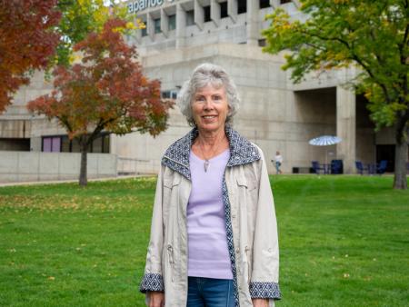 Littleton resident and Littleton Rotary Club member Ms. Terry M. Terry on the west side of ACC's Main Building at the Littleton Campus.