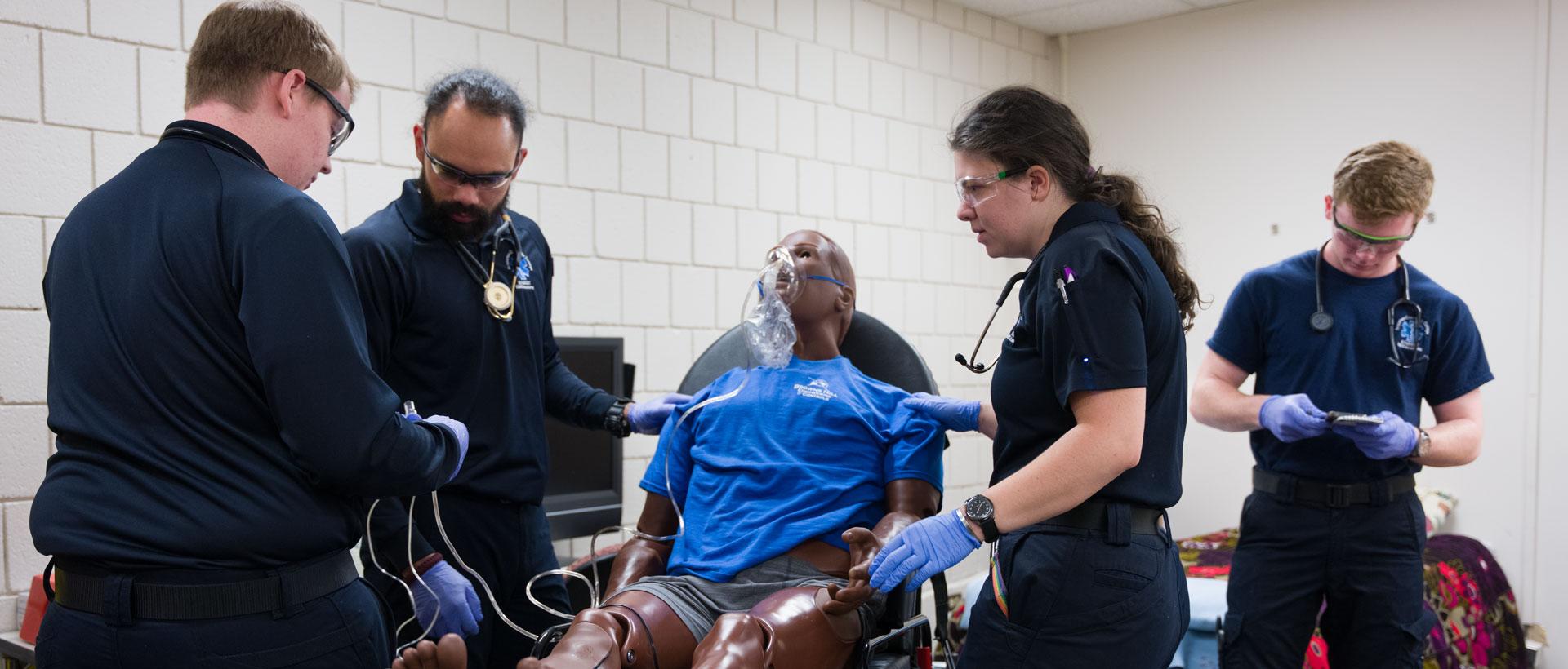 EMS Students working together in ACC classroom at the Littleton Campus.
