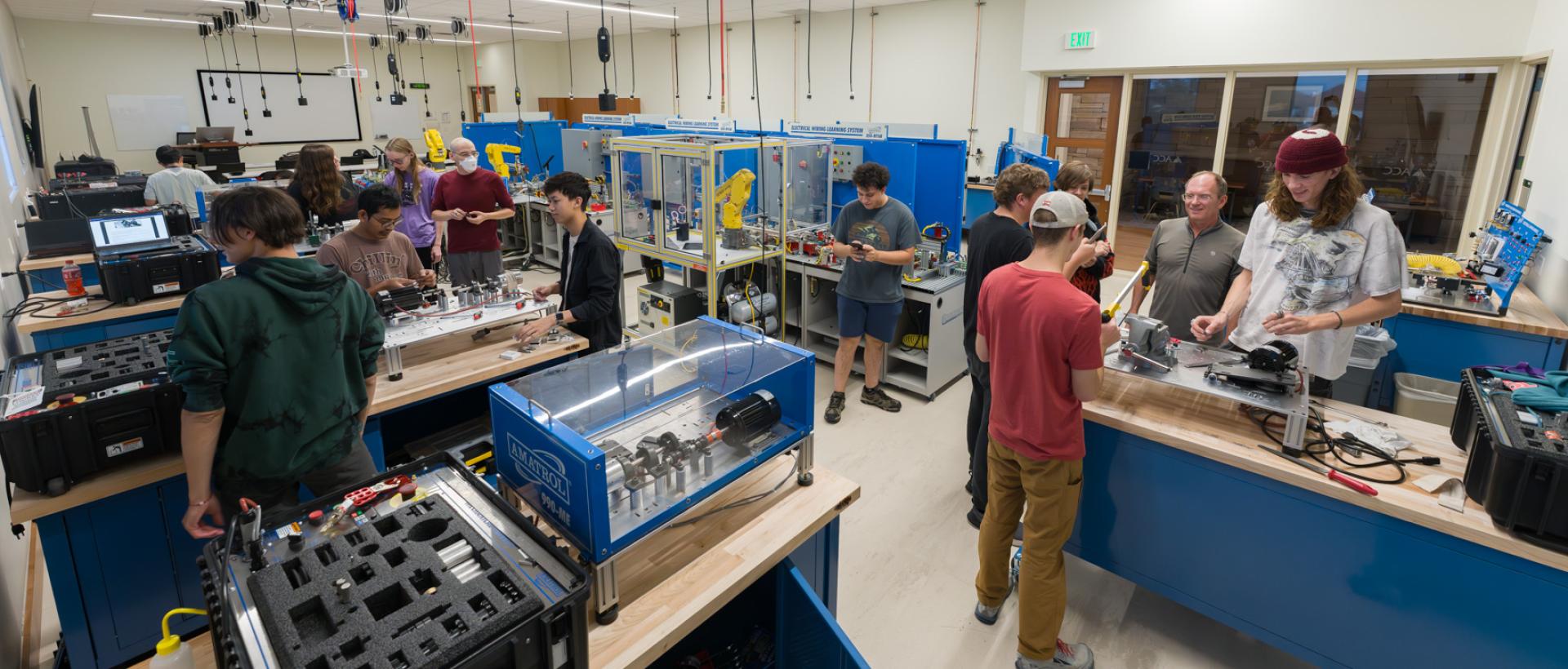 ACC Robotics class/lab with students at stations at the DCSD Legacy Campus.