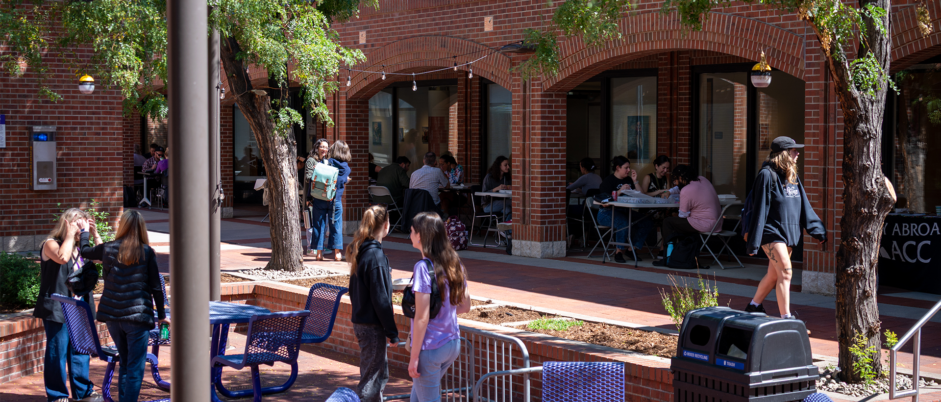 ACC staff and students in the courtyard at the Art & Design Center at the Littleton Campus.