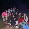 ACC TRIO SSS students around a campfire during a community building trip to Estes Park, CO.